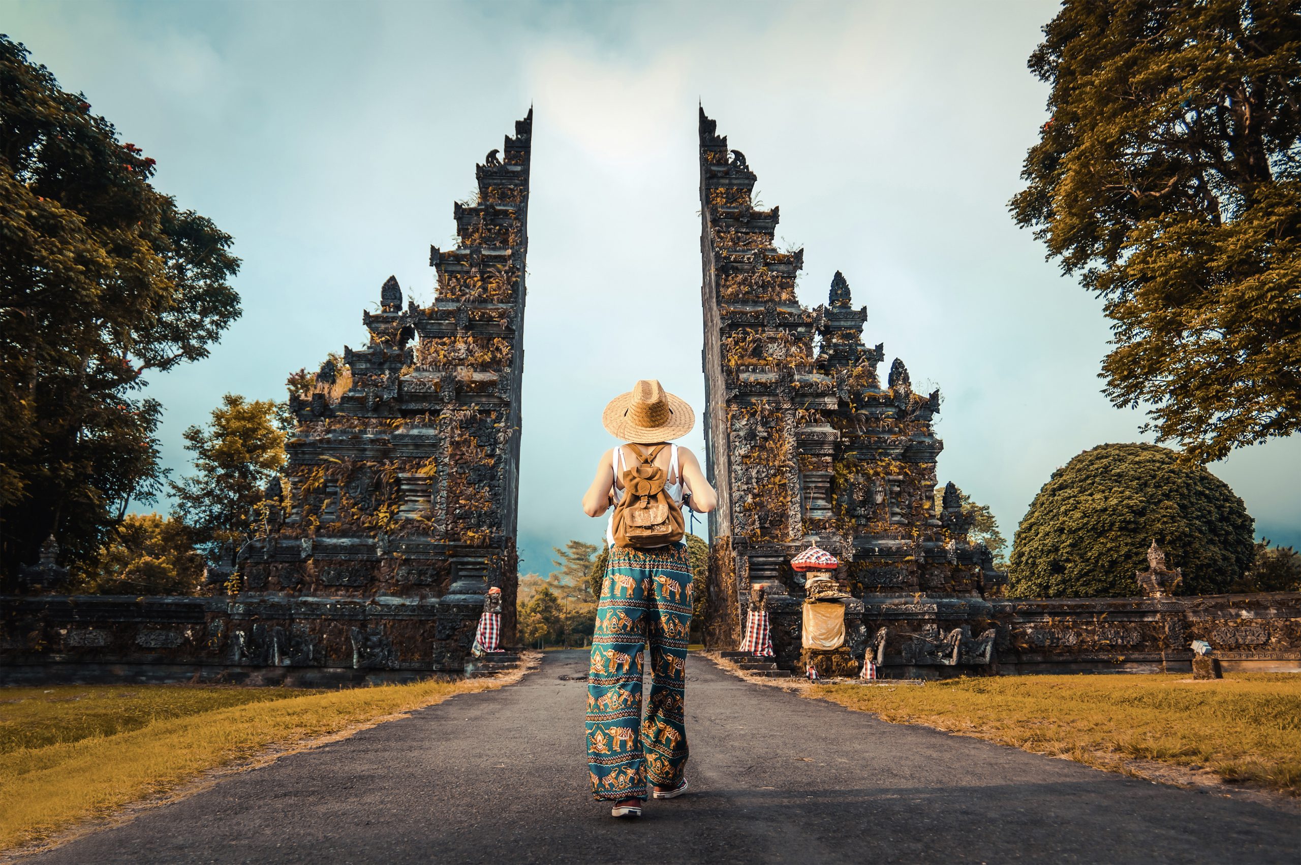 woman with backpack exploring bali indonesia 2023 11 27 05 05 12 utc 1 scaled
